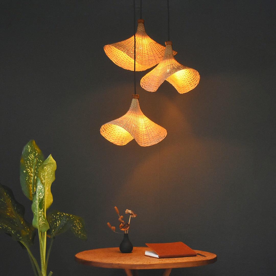 Handcrafted bamboo pendant light with a warm, natural glow cluster of 3