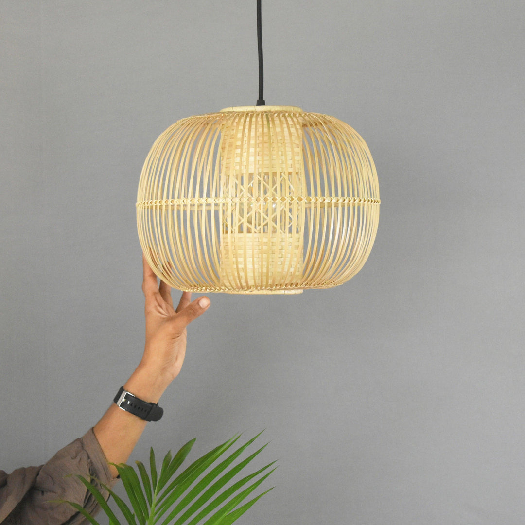 Handcrafted bamboo pendant light with a warm, natural glow