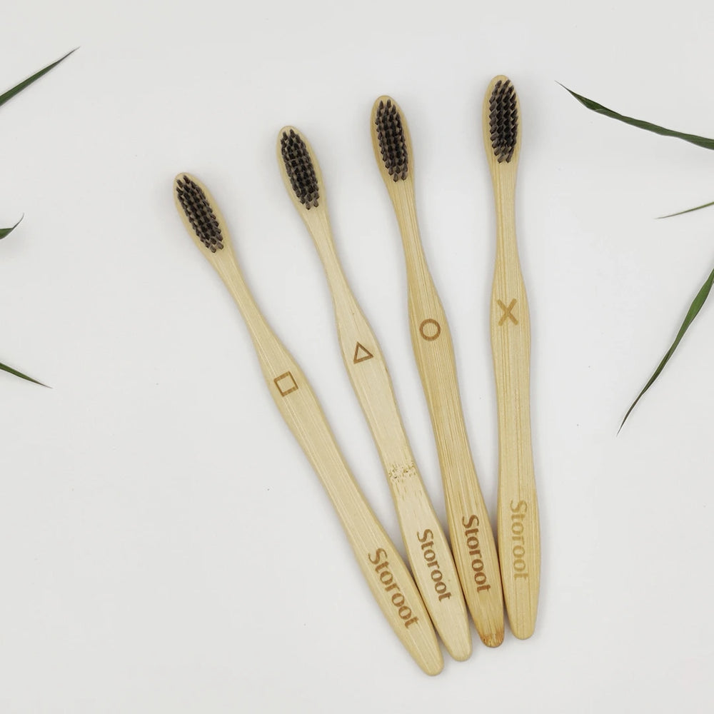 A top-down view of bamboo charcoal toothbrushes from Storoot, arranged neatly on a white background.