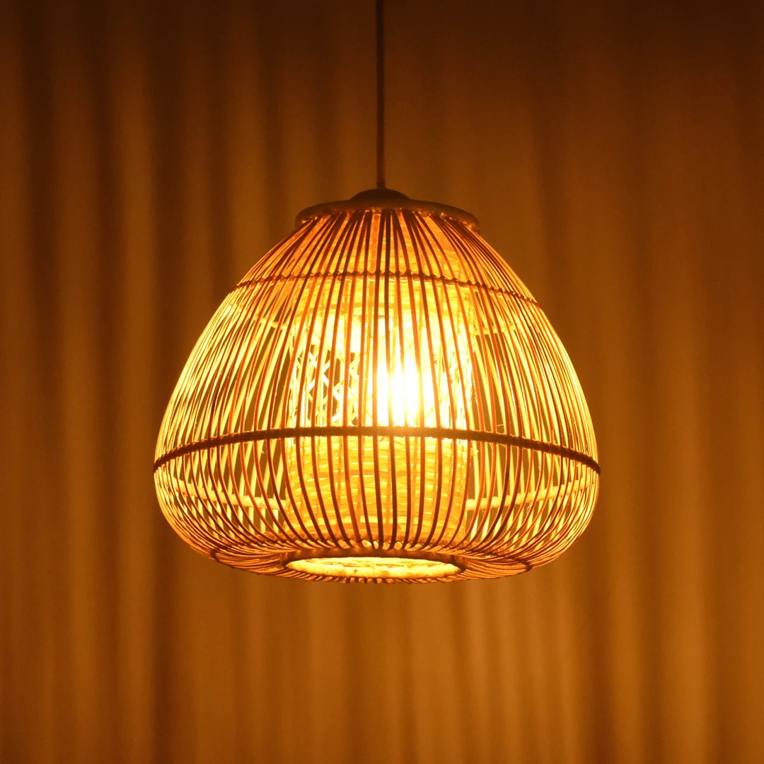 Detailed view of Mushroom Bamboo Pendant Light's wicker-like pattern. This bamboo ceiling light adds a touch of warmth and elegance to any space.