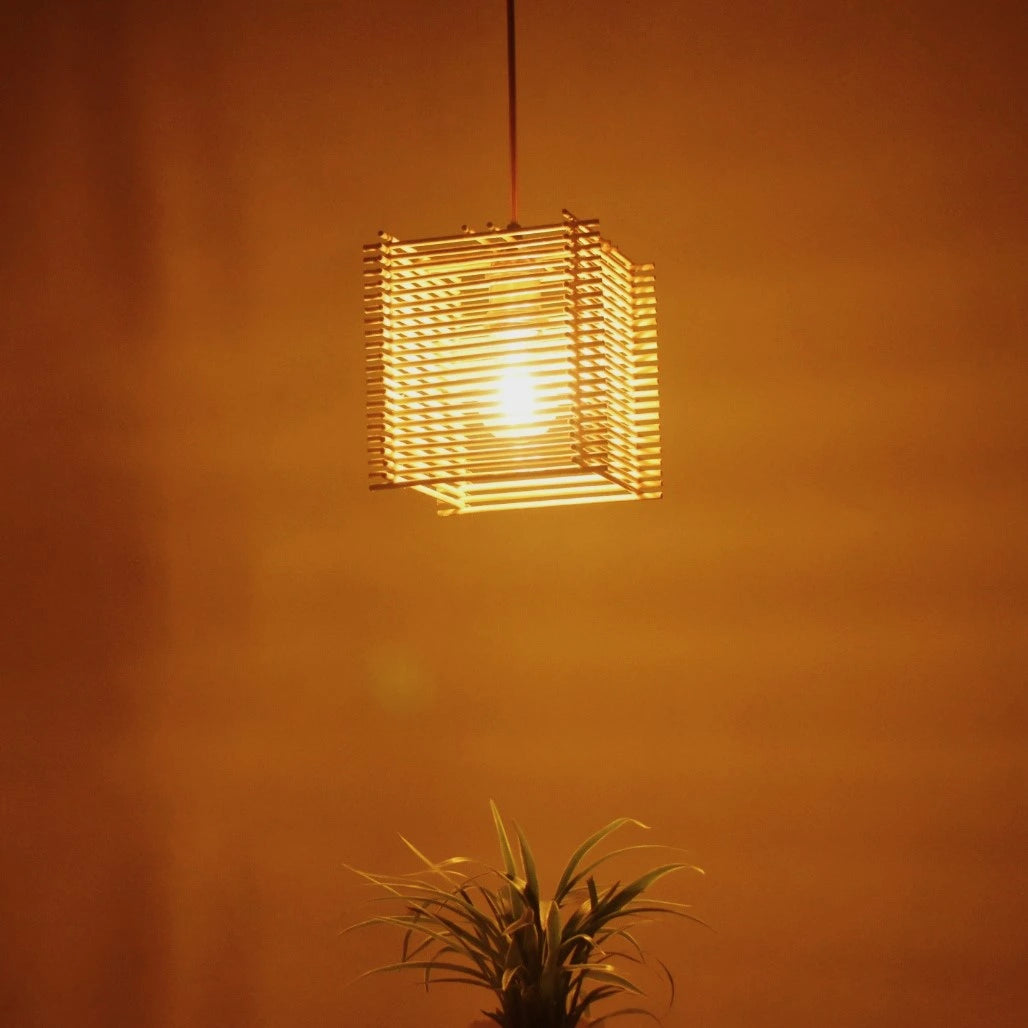 Warm ambiance of LightNest Square Bamboo Pendant Light - A beautiful, glowing light casting a soft, warm ambiance in a room