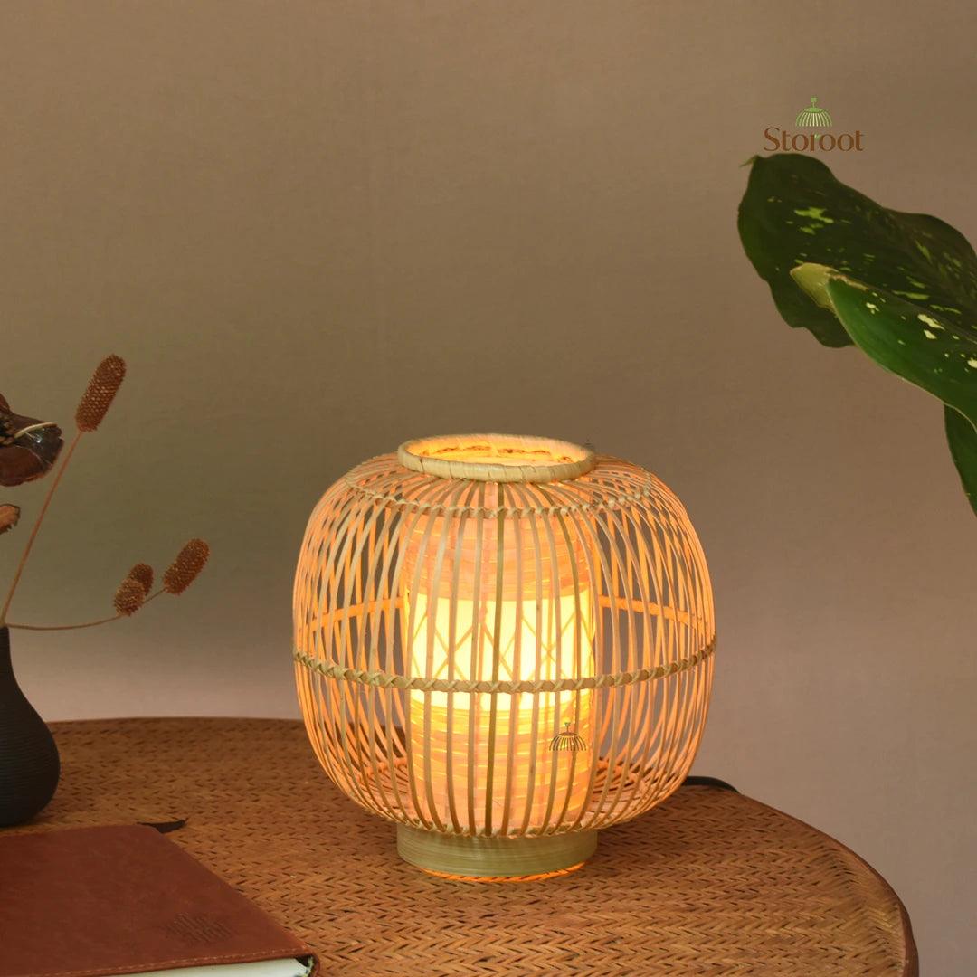 Huba Bamboo Table Lamp providing a warm and cozy ambiance.