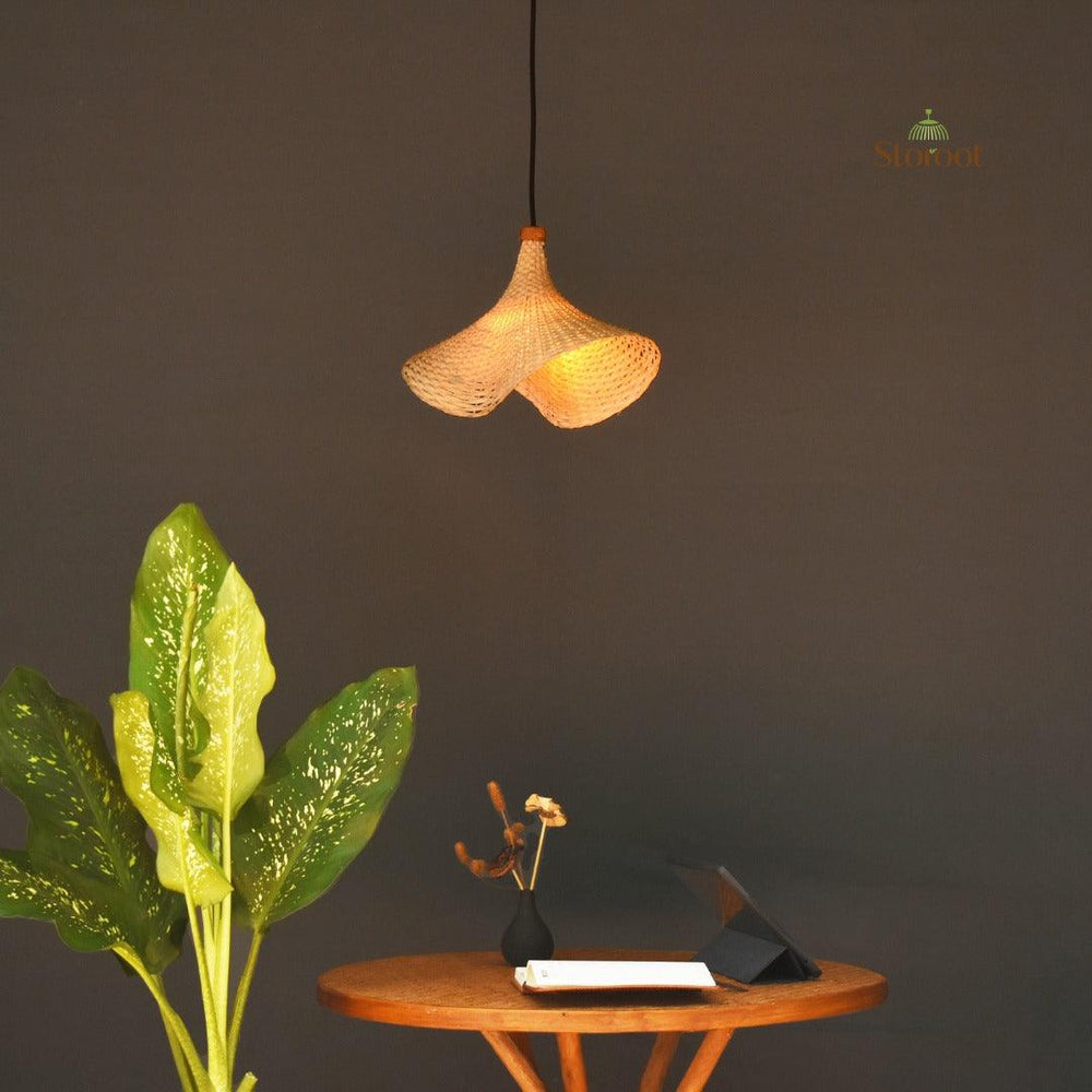 Woven Bamboo Lighting by Indian Artisans over a table