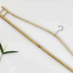 Upgrade your closet with a sustainable bamboo double hanger for eco-conscious living